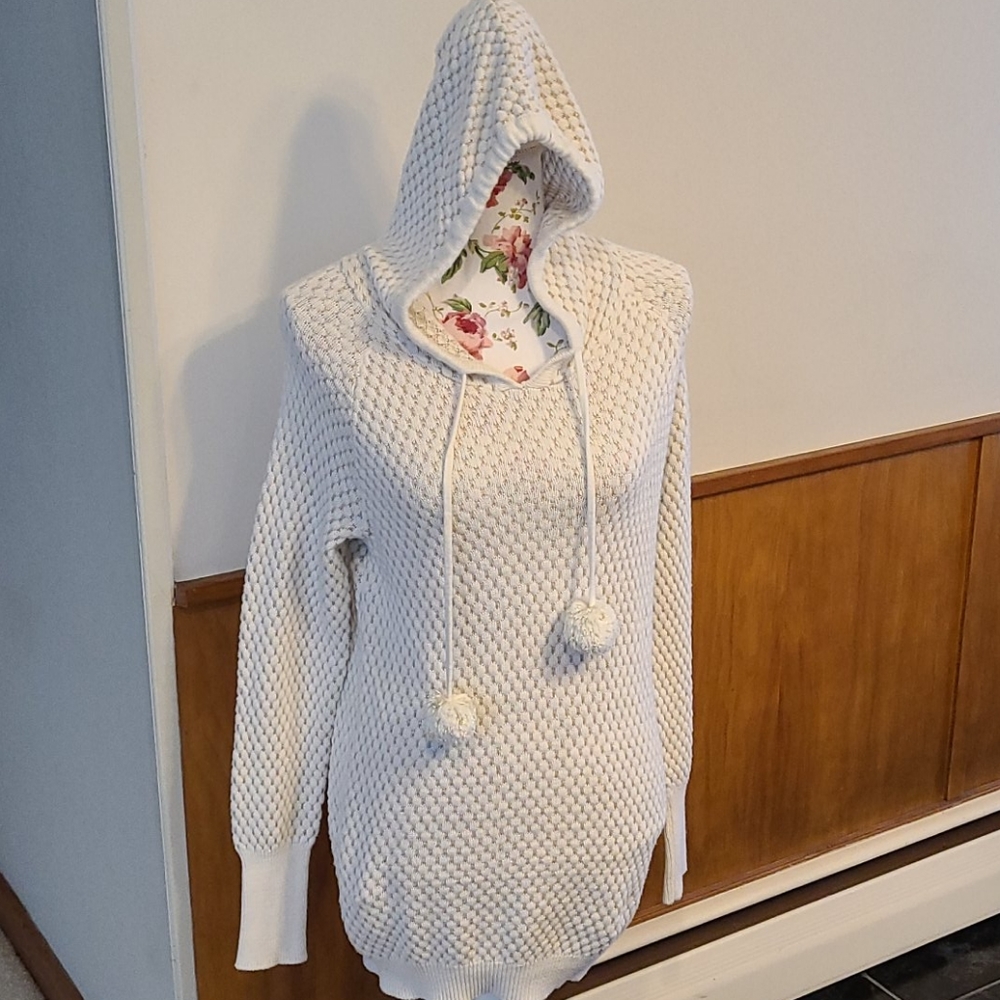 Wearing your heart on your sleeve sweater